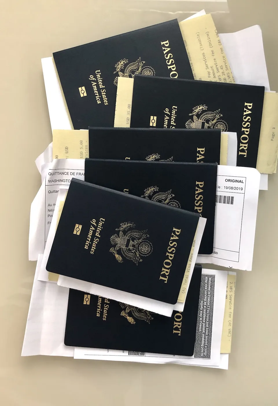 US passports with visa fee receipts